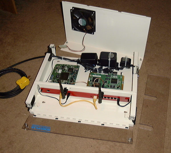 Interior with cooling fan and Lexan cover installed